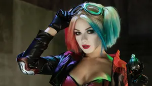Captivating Harley Quinn Cosplay In Action Wallpaper