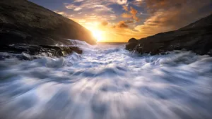 Captivating High Tide At Sunset Wallpaper