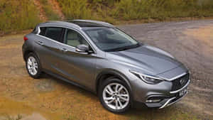 Captivating Infiniti Qx30 In The Wilderness Wallpaper