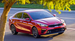 Captivating Kia Forte In Vivid Red Wallpaper