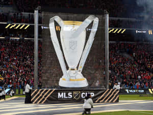 Captivating Landscape With High Mountains And Serene Lake Wallpaper