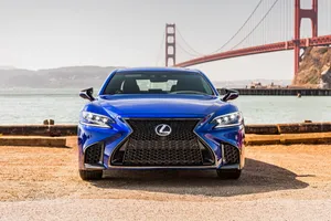 Captivating Lexus Ls 500 In Bold Red Wallpaper