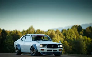Captivating Mazda Rx-3 In Its Full Glory Wallpaper