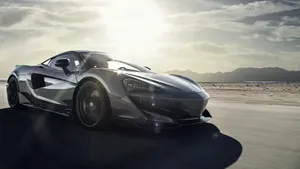 Captivating Mclaren 600lt In Motion Wallpaper
