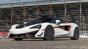 Captivating Mclaren 620r In Action Wallpaper