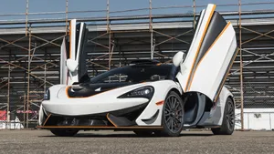 Captivating Mclaren 620r In Action Wallpaper