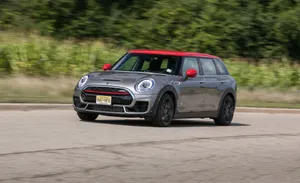 Captivating Mini Cooper S Clubman All4 In Action Wallpaper