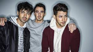 Captivating Moments Of The Jonas Brothers Wallpaper