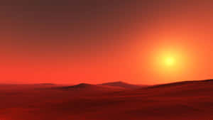 Captivating Red Sunset Over The Horizon Wallpaper