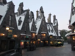 Captivating Scenery Of Hogsmeade Village During Winter Wallpaper