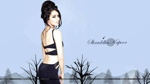 Captivating Shraddha Kapoor In Vibrant Ensemble Wallpaper