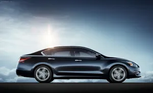 Captivating Silver Nissan Altima In Perfect Lighting Wallpaper