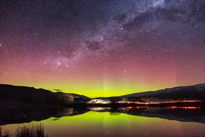 Captivating Southern Lights Dancing In The Night Sky Wallpaper