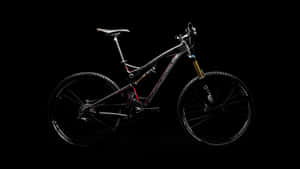 Captivating Specialized Mountain Bike In Action Wallpaper