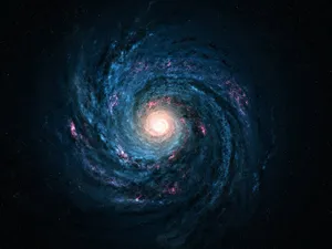 Captivating Spiral Galaxy In The Vast Universe Wallpaper