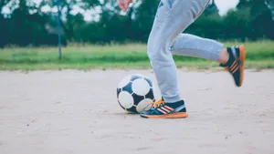 Captivating Street Soccer Showdown Wallpaper