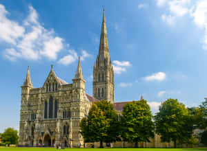 Captivating View Of Salisbury Cathedral At Sundown Wallpaper