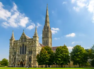Captivating View Of Salisbury Cathedral At Sundown Wallpaper