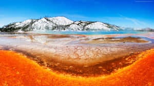 Captivating View Of Yellowstone Geysers Eruption Wallpaper