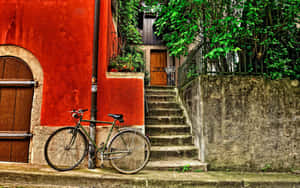 Captivating Vintage Bicycle On The Street Wallpaper