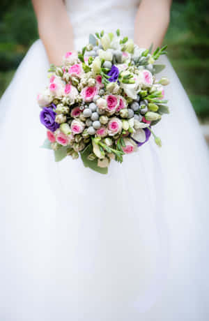 Captivating Wedding Bouquet In Full Bloom Wallpaper