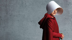 Captive June Osborne In The Handmaid's Tale Wallpaper