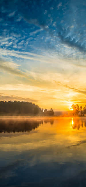 Capture The Magical Moment Of Sunrise Wallpaper