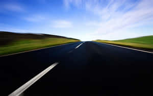 Capturing A Beautiful Moment Of Motion Blur Wallpaper