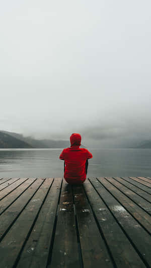 Capturing Emotion: Cool Sad Boy In Red Wallpaper