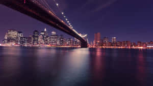 Capturing The Glittering Brilliance Of New York City At Night Wallpaper