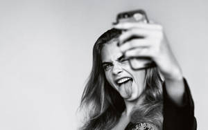 Cara Delevingne Wacky Selfie Wallpaper