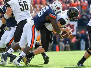 Carl Lawson Tackles Rival Wallpaper