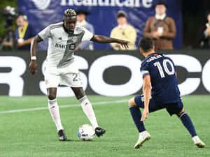 Carles Gil Guarding Victor Wanyama Wallpaper