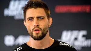 Carlos Condit Demonstrating His Exceptional Kickboxing Skills Wallpaper