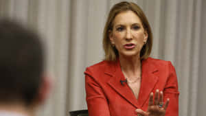 Carly Fiorina In Red Coat Wallpaper