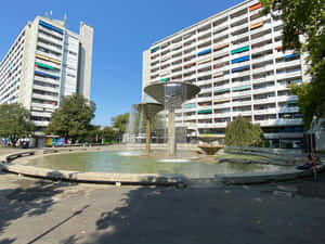 Carouge Fountainand Apartment Buildings Wallpaper