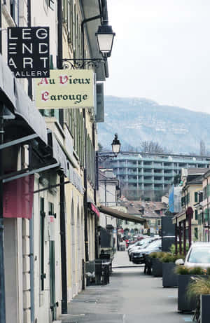 Carouge Street Viewwith Mountains Wallpaper