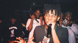 Carti Pfp Rapping Passionately Wallpaper