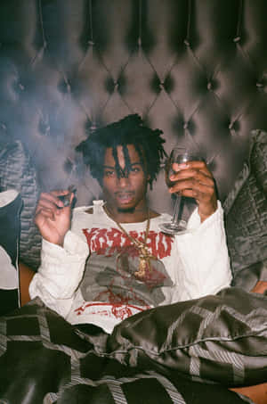 Carti Pfp Smoking In Bed Wallpaper