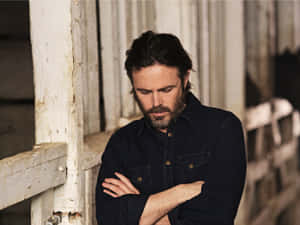 Casey Affleck Engrossed In Thought Wallpaper