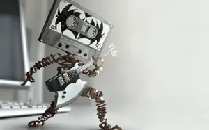 Cassette Man Rocking Out Wallpaper