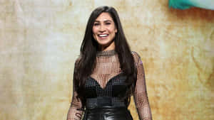 Cassie Steele Smilingin Black Outfit Wallpaper