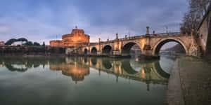 Castel Santangelo And The Ancient Roman Bridge Wallpaper