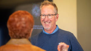 Casual David Duval Smiling At Lady Wallpaper