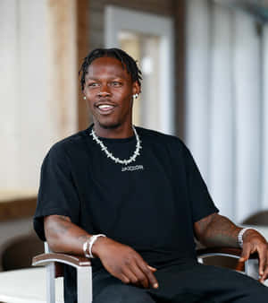 Casual Portraitof Manin Black Shirt Wallpaper