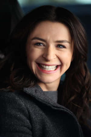 Caterina Scorsone Smiling Portrait Wallpaper