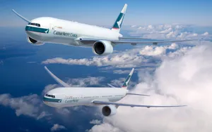 Cathay Pacific Boeing Aircraftsin Flight Wallpaper