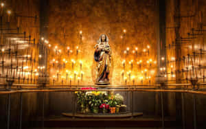 Catholic Votive Candlesand Mary Statue Wallpaper