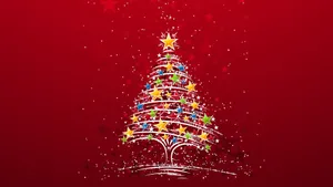 Celebrate Christmas With A Colorful Starry Tree Wallpaper