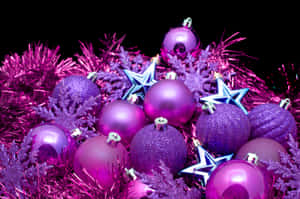 Celebrate Christmas With A Purple Theme Wallpaper